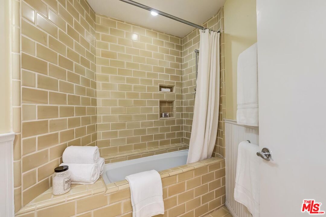 751 Teakwood Road Los Angeles, CA 90049 - Photo 36 of 46 a bathroom with a shower