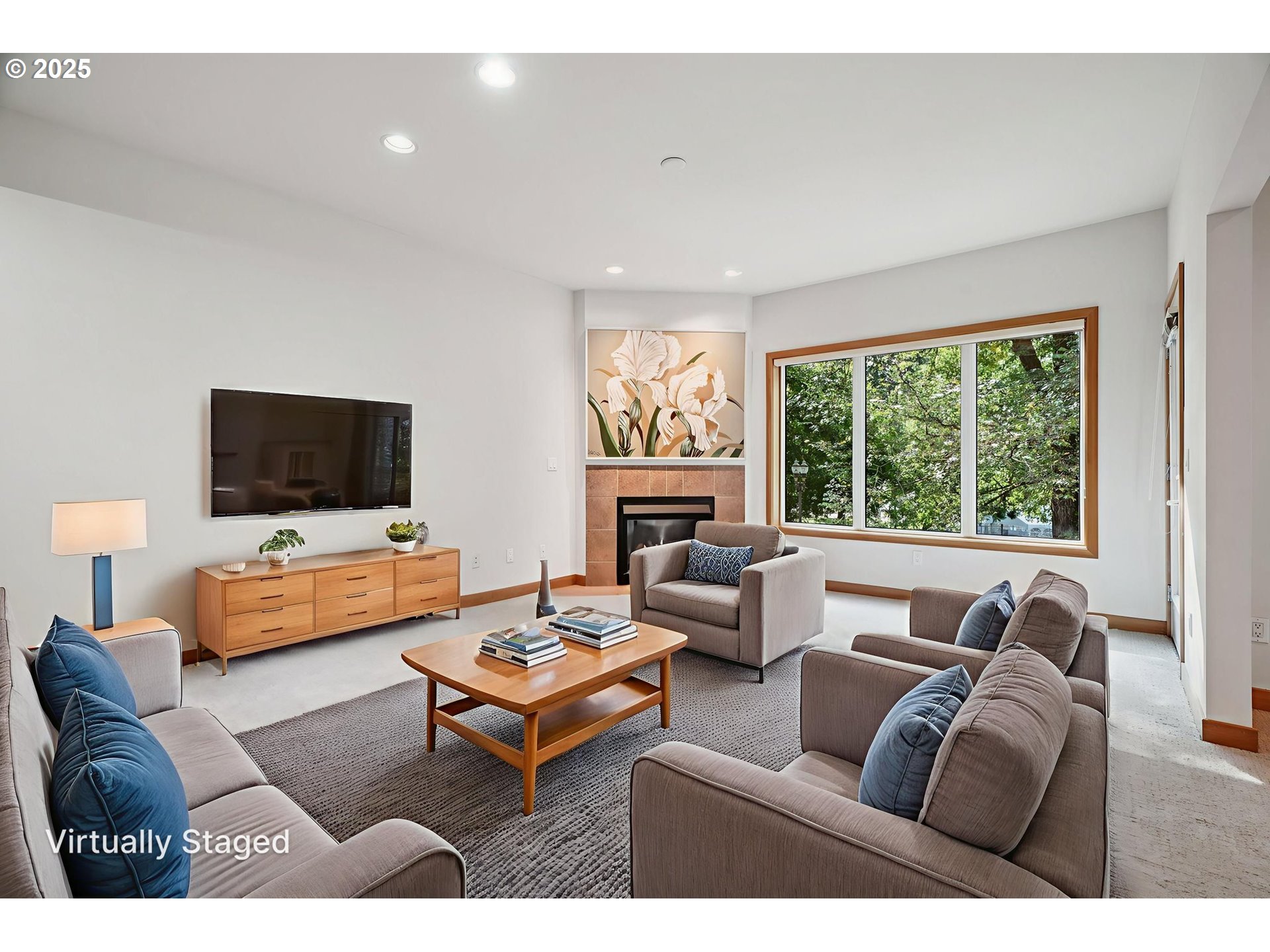 300 West 8th Street, Unit 206 Vancouver, WA 98660 - Photo 11 of 42 a living room with furniture and a flat screen tv