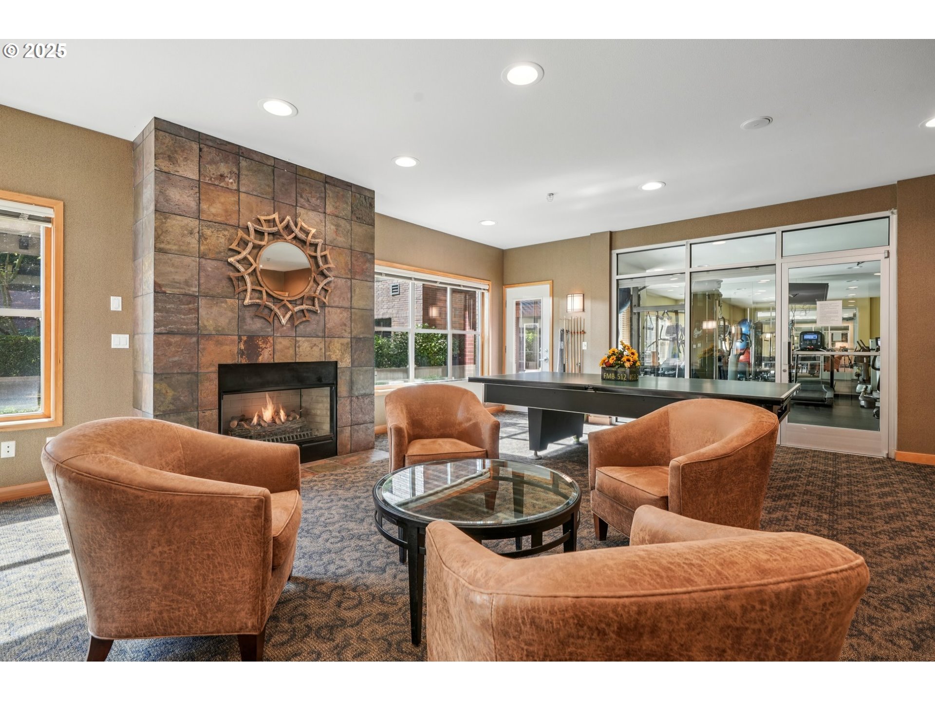 300 West 8th Street, Unit 206 Vancouver, WA 98660 - Photo 31 of 42 a living room with furniture and a fireplace