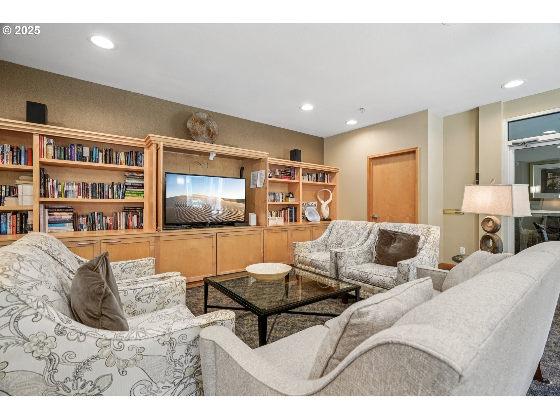 300 West 8th Street, Unit 206 Vancouver, WA 98660 - Photo 33 of 42 a living room with furniture and a flat screen tv