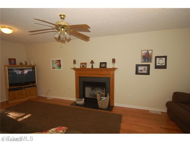 5550 Jason Road Greensboro, NC 27405 - Photo 16 of 16 Exterior Front. Enjoy the fireplace and hardwood floors