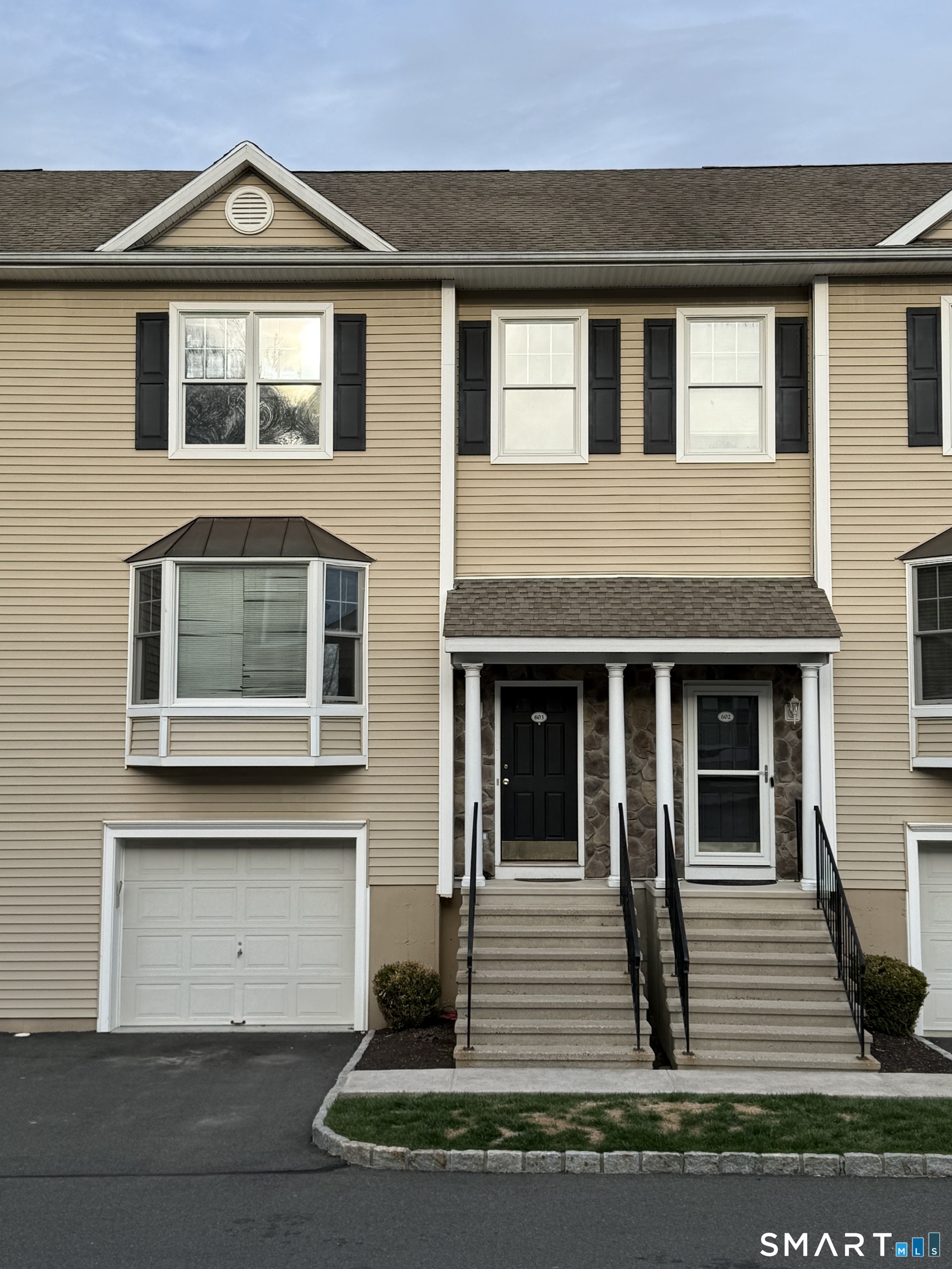 15 Scuppo Road, Unit 603 Danbury, CT 06811 - Photo 3 of 29 a front view of a house