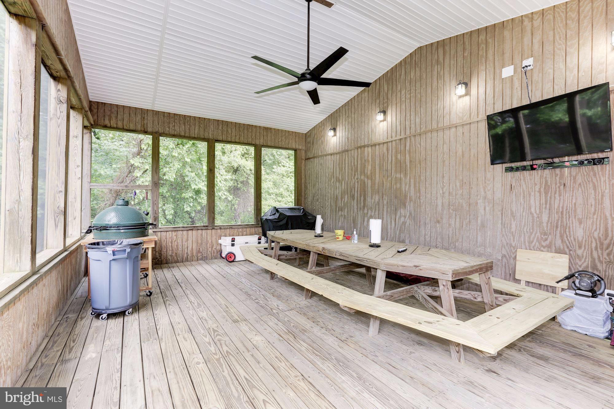 1723 Bayside Beach Road Pasadena, MD 21122 - Photo 56 of 67 Fully screened porch with custom table