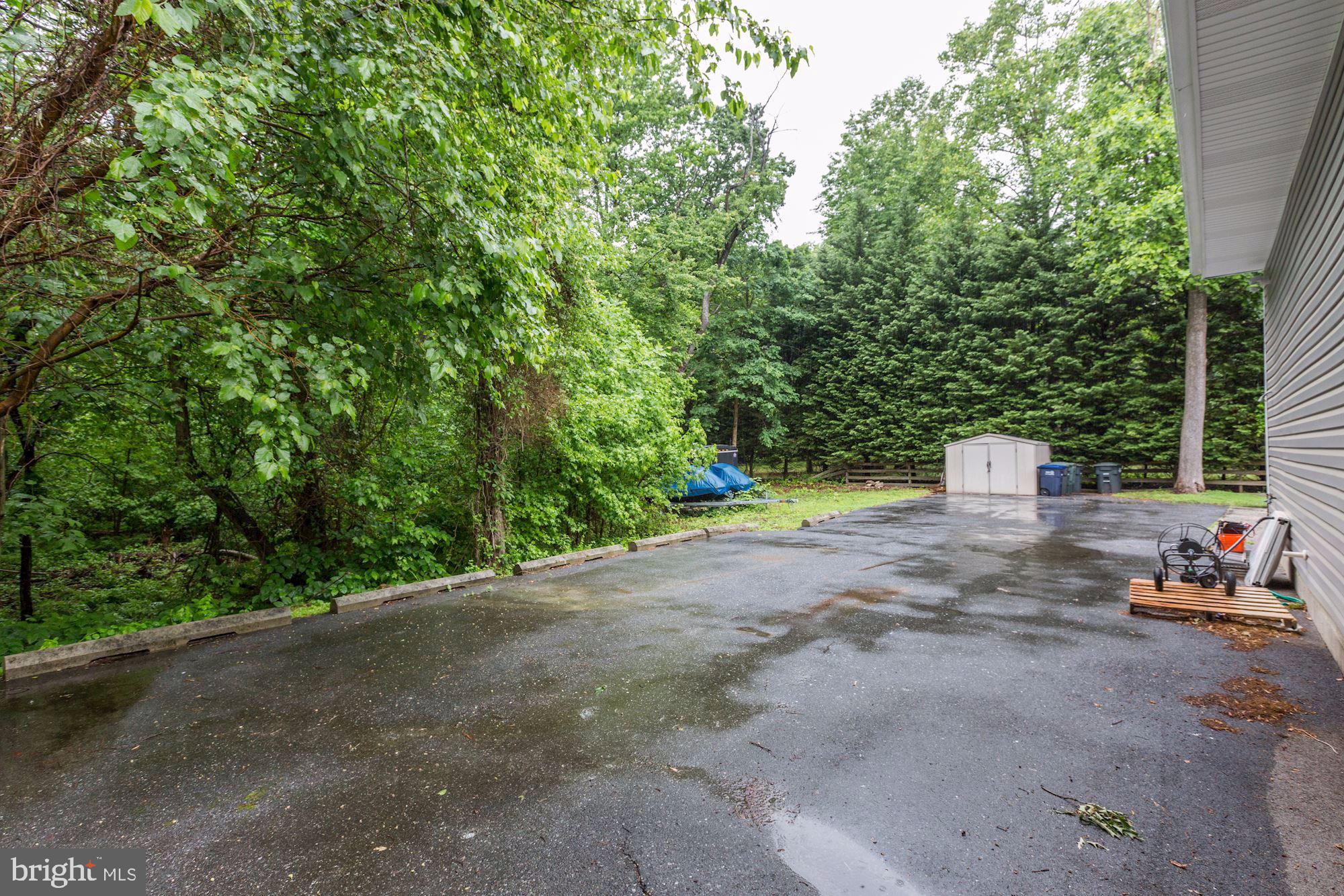 1723 Bayside Beach Road Pasadena, MD 21122 - Photo 67 of 67 Parking on side of the house