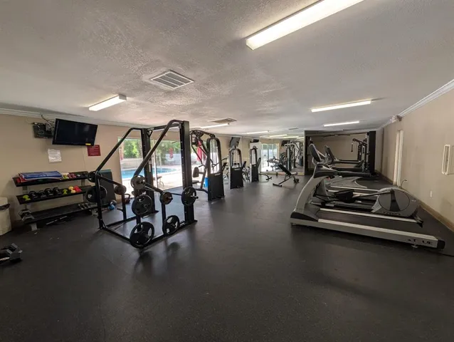 a view of a room with gym equipment