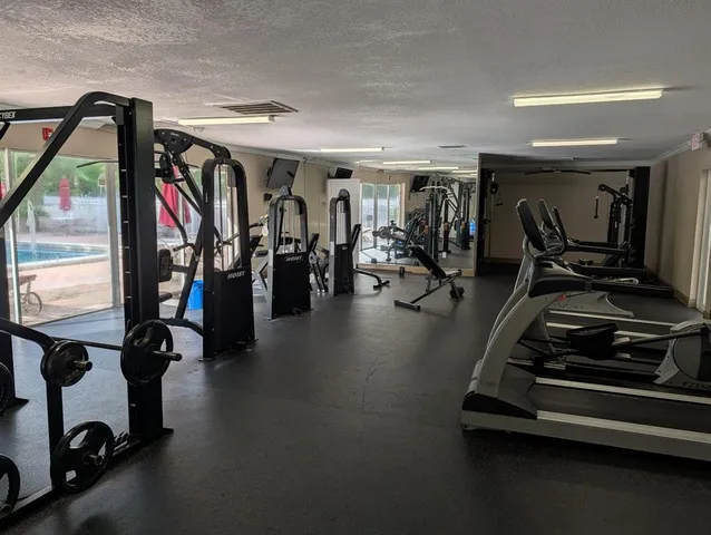 a view of a room with gym equipment
