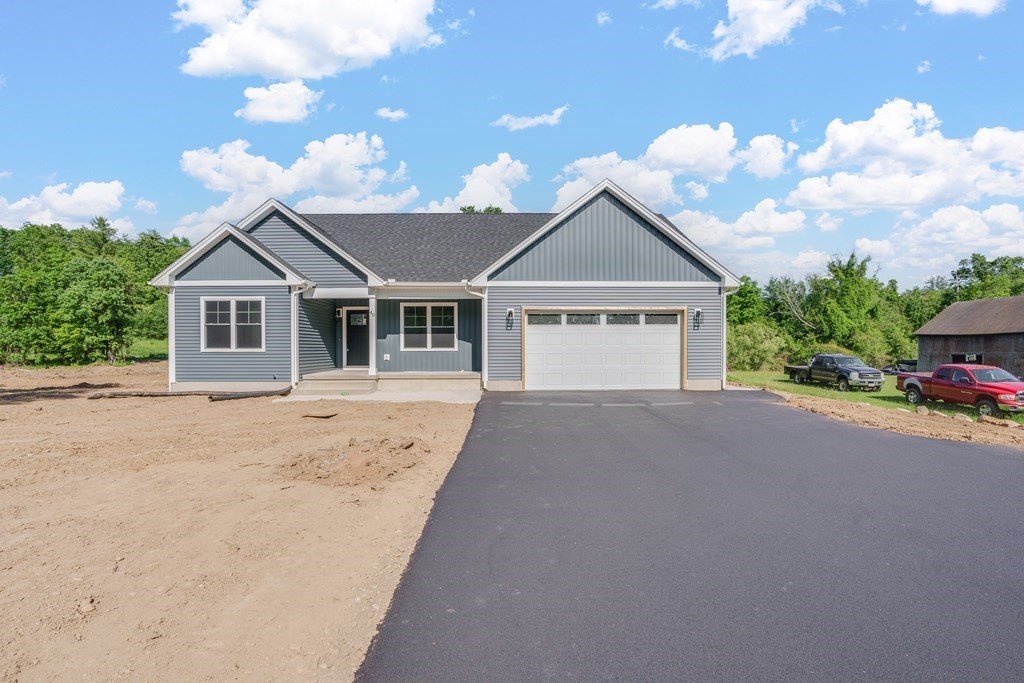 40 Mort Vining Road Southwick, MA 01077 - Photo 25 of 32 a big house with palm trees in the background