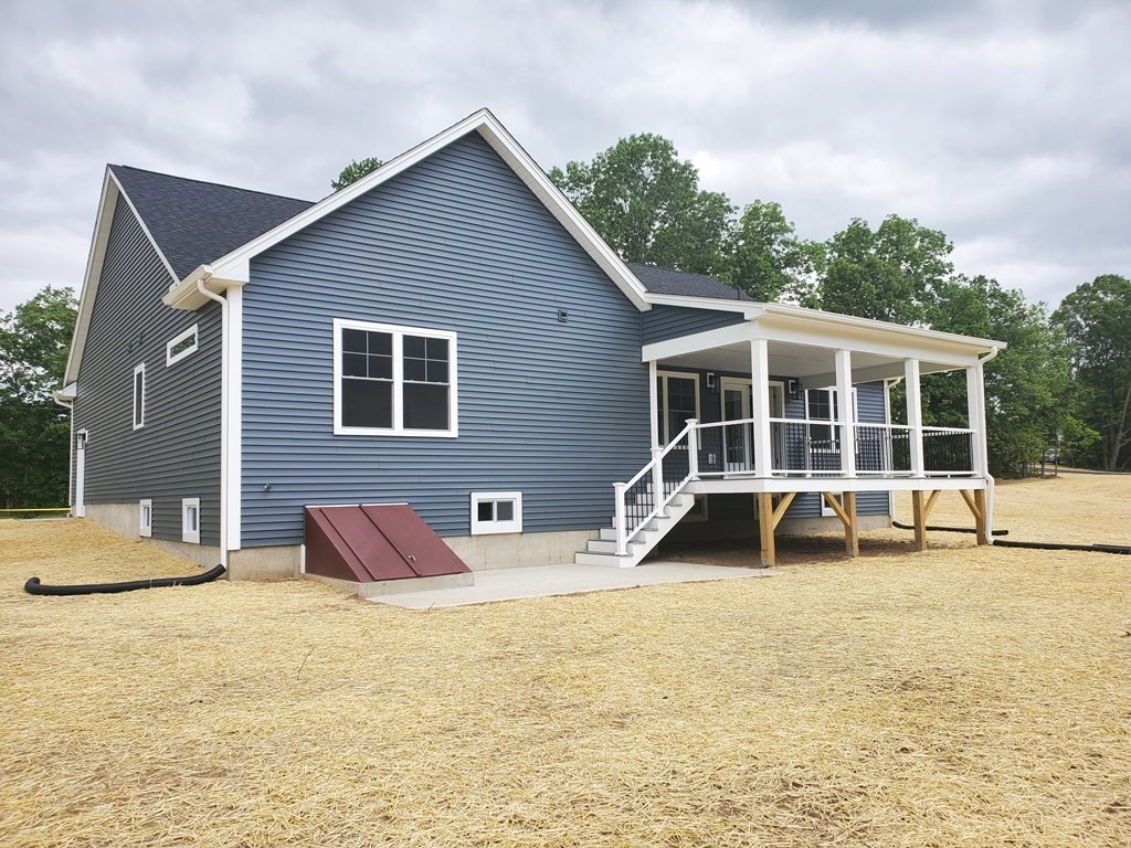 40 Mort Vining Road Southwick, MA 01077 - Photo 28 of 32 a house view with swimming pool and porch
