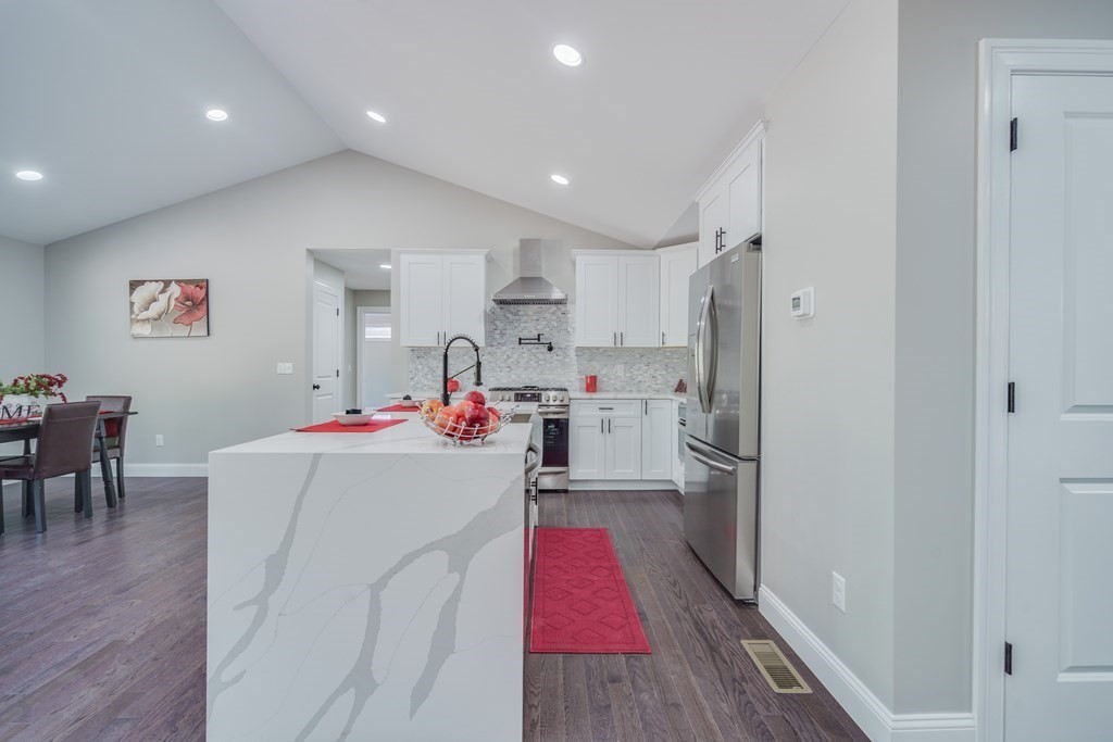 40 Mort Vining Road Southwick, MA 01077 - Photo 5 of 32 a living room with stainless steel appliances furniture and wooden floor