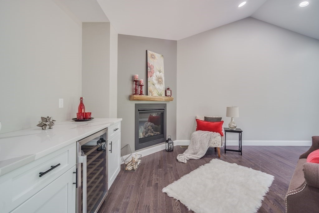40 Mort Vining Road Southwick, MA 01077 - Photo 9 of 32 a living room with furniture and a fireplace