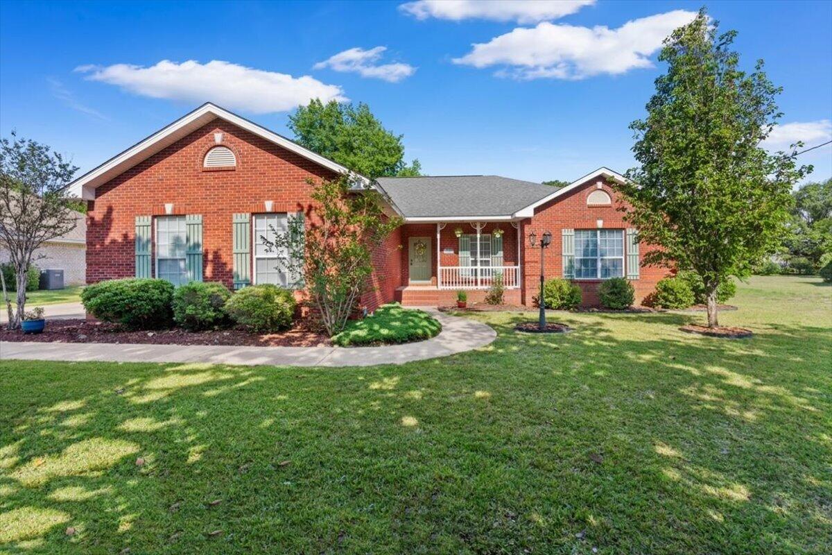 1830 Seahawk Lane Navarre, FL 32566 - Photo 1 of 53 a front view of a house with a yard