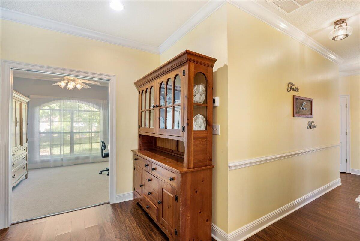 1830 Seahawk Lane Navarre, FL 32566 - Photo 8 of 53 a view of kitchen with furniture and wooden floor