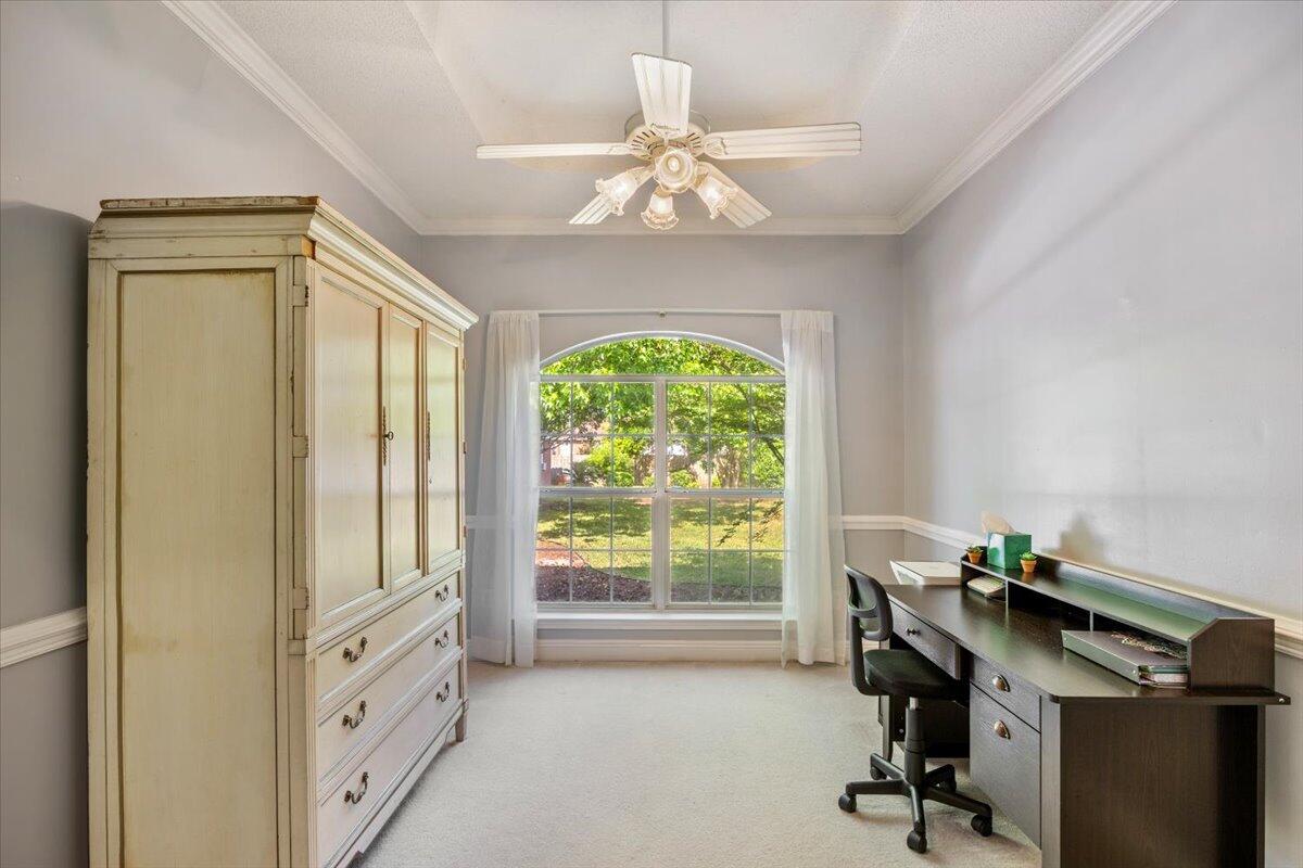 1830 Seahawk Lane Navarre, FL 32566 - Photo 9 of 53 a view of a workspace with furniture and a window