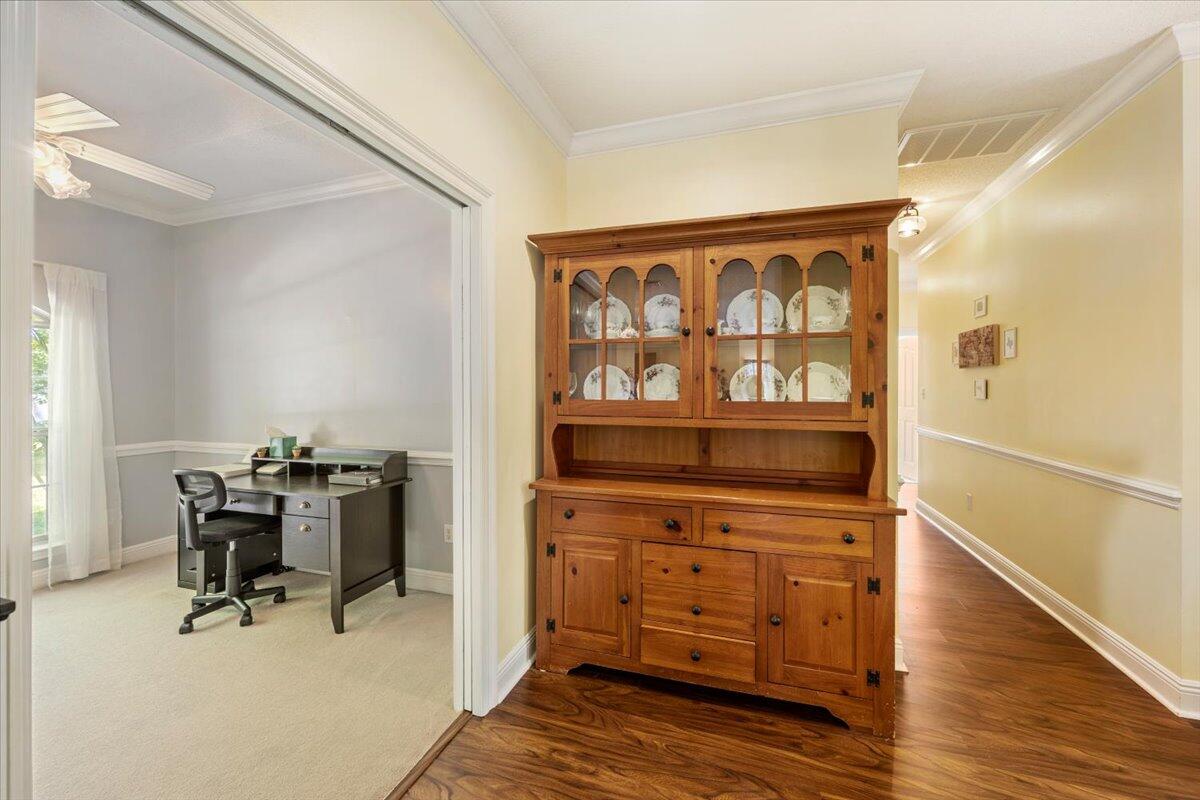 1830 Seahawk Lane Navarre, FL 32566 - Photo 10 of 53 a view of workspace with wooden floor