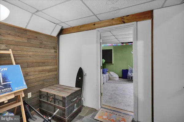 a view of a balcony with table and chairs