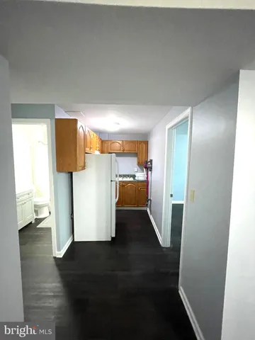 a view of room with window and ceiling fan