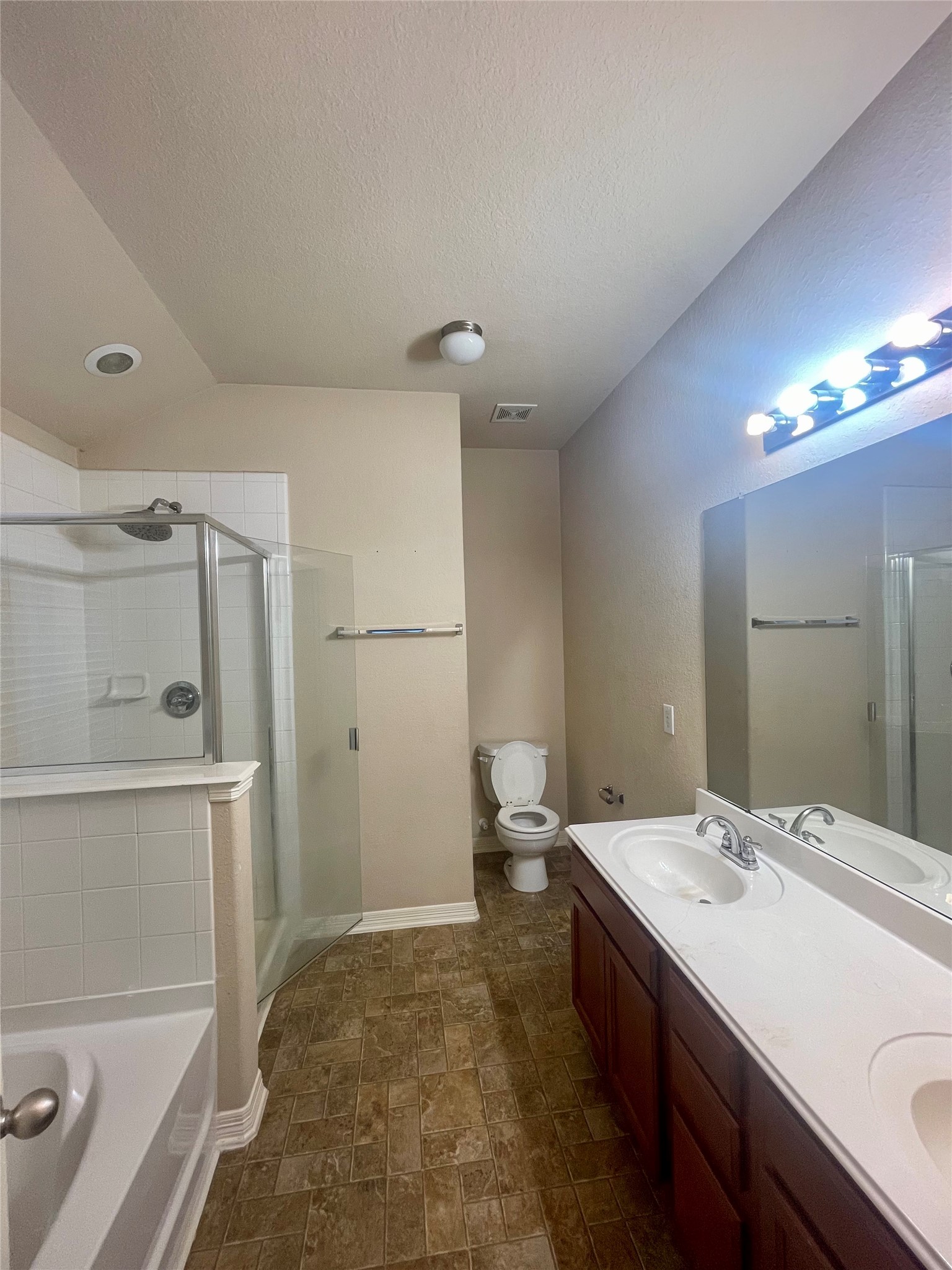 722 Pequin Road Crosby, TX 77532 - Photo 8 of 12 a bathroom with a sink a toilet and shower