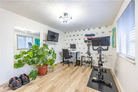a view of a room with gym equipment