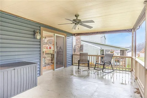 a view of a kitchen with a sink and a window