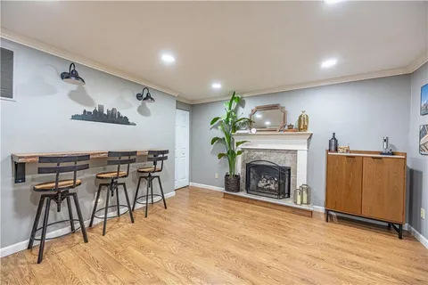 a view of a livingroom with furniture and a fireplace