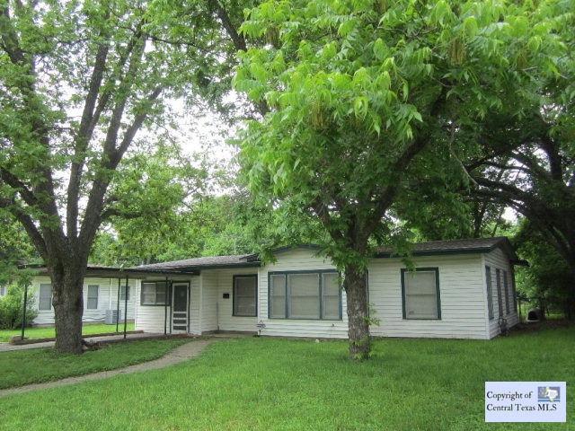 964 Baker Street Seguin, TX 78155 - Photo 1 of 1 front view of a house with a yard
