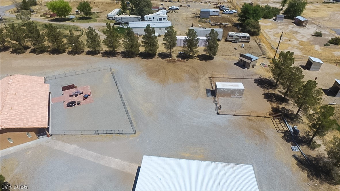 2381 Tough Boy Road Pahrump, NV 89060 - Photo 41 of 44 An aerial view showcases the expansive lot with several structures and ample space.