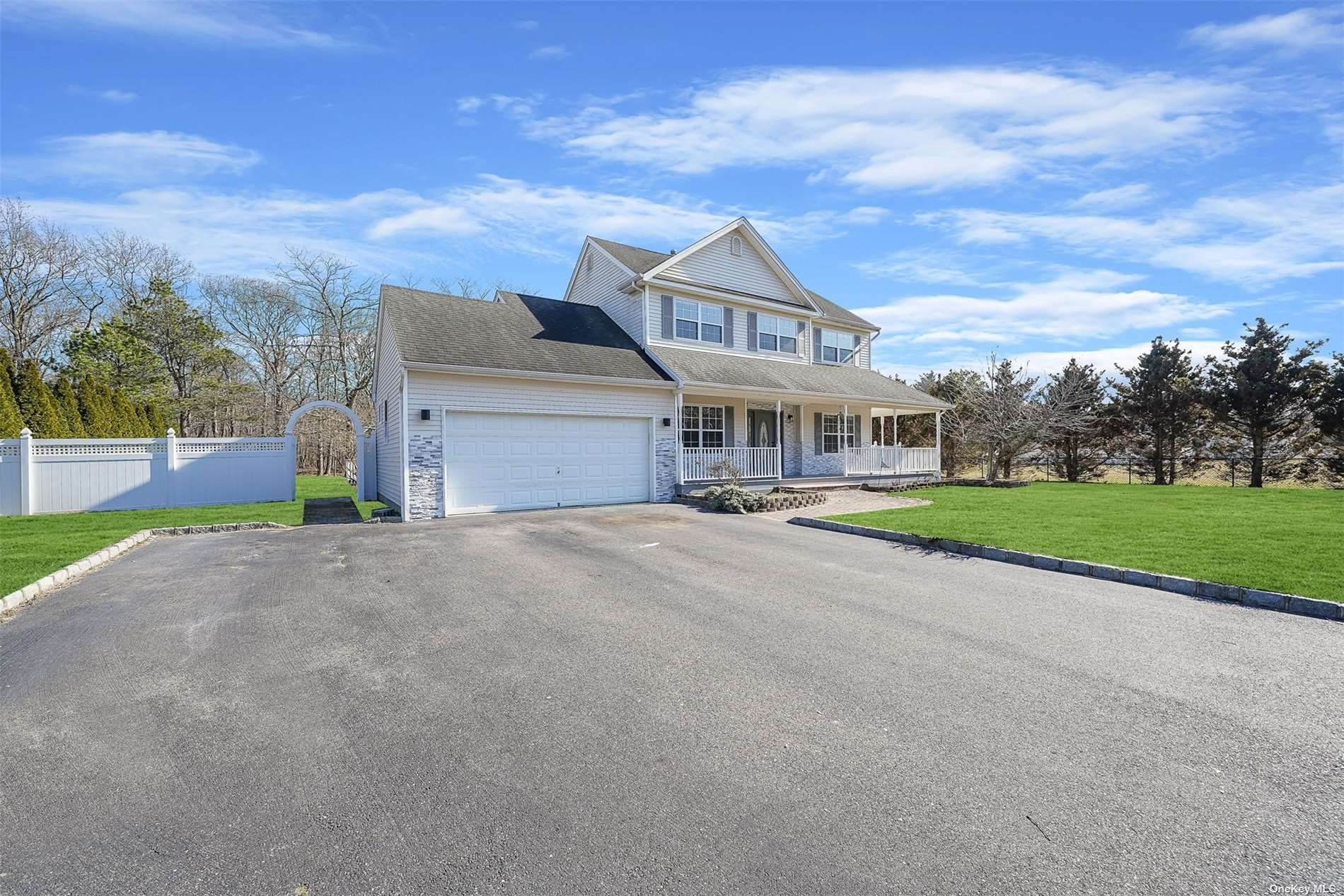 37 James Hawkins Road Moriches, NY 11955 - Photo 1 of 1 a front view of a house with a yard