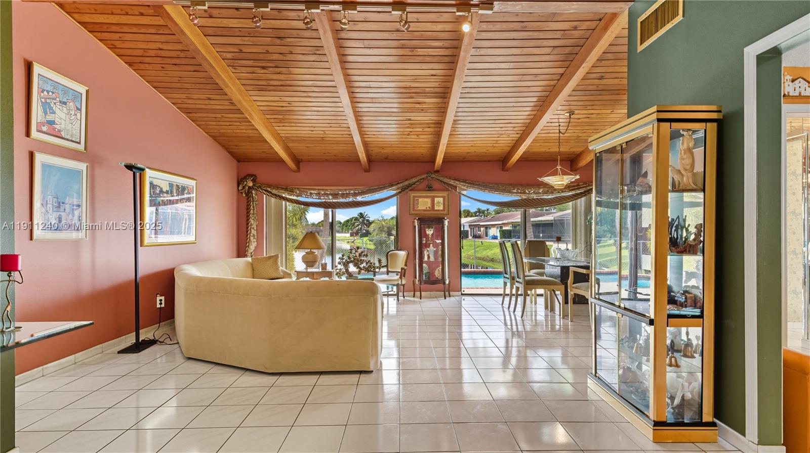 14604 Southwest 60th Terrace Miami, FL 33183 - Photo 16 of 55 a dining room with furniture and large windows