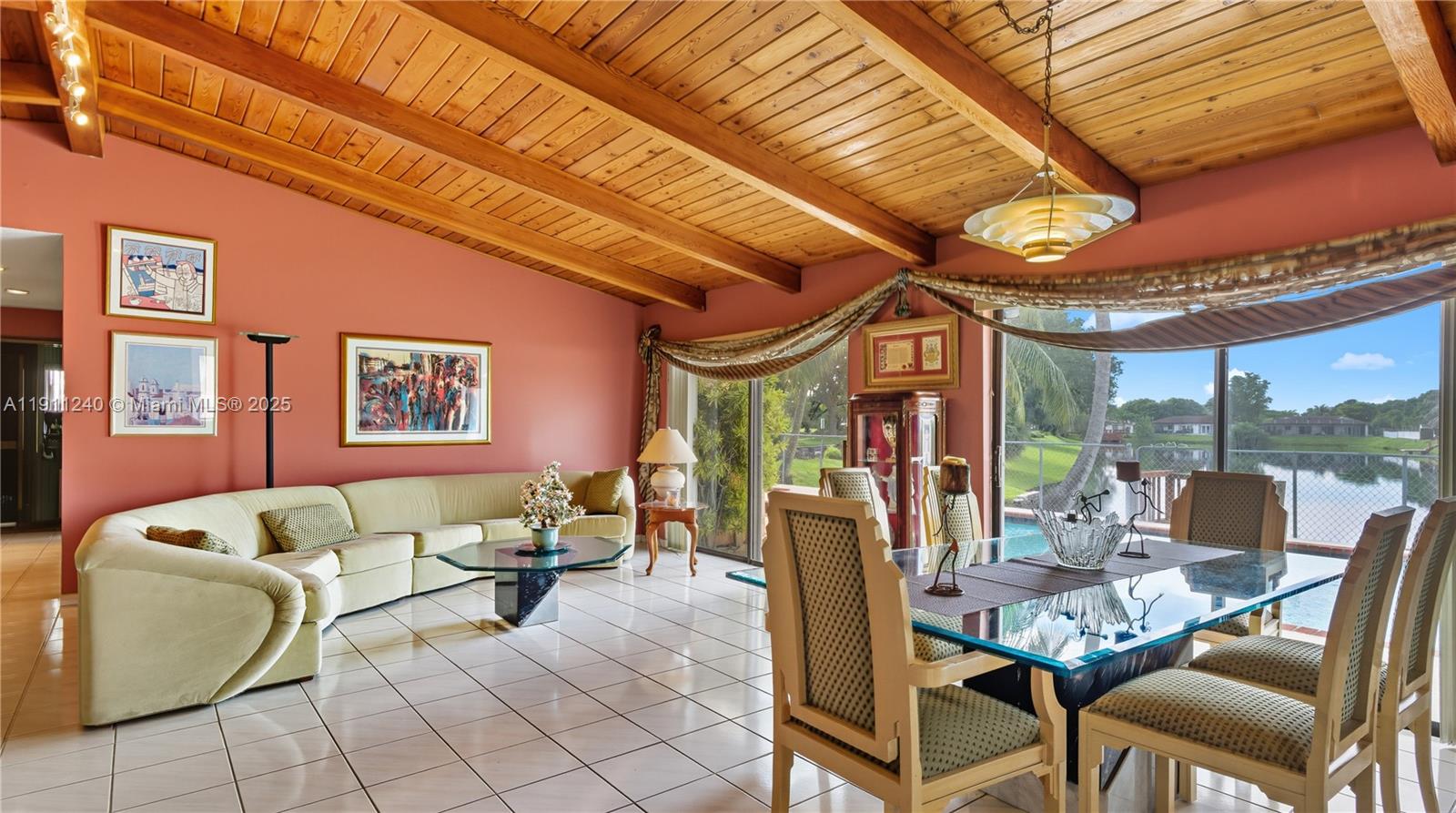 14604 Southwest 60th Terrace Miami, FL 33183 - Photo 3 of 55 a view of a dining room with furniture a chandelier and wooden floor