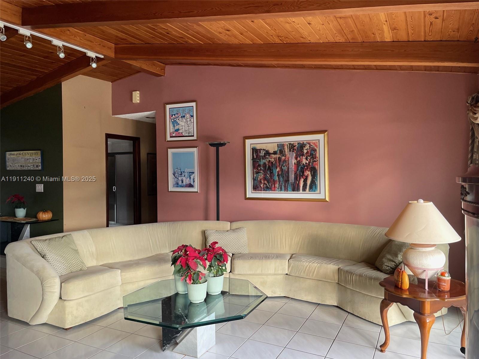 14604 Southwest 60th Terrace Miami, FL 33183 - Photo 50 of 55 a living room with furniture and a chandelier