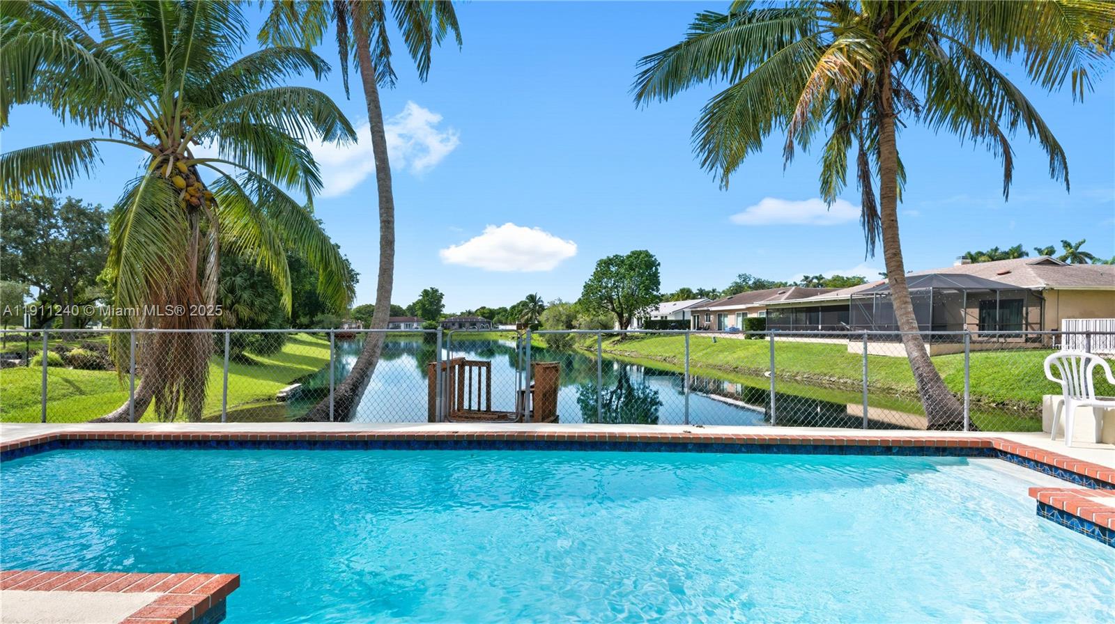 14604 Southwest 60th Terrace Miami, FL 33183 - Photo 5 of 55 a view of a garden with a lake