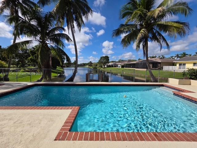 14604 Southwest 60th Terrace Miami, FL 33183 - Photo 53 of 55 front view of house with a yard