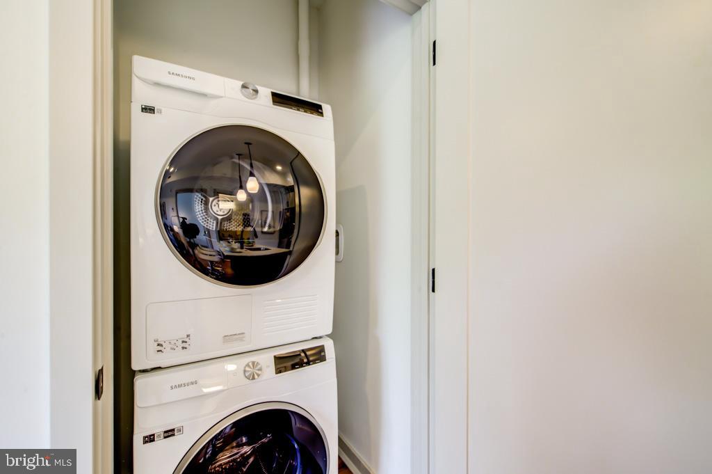 5001 Umbria Street, Unit P202 Philadelphia, PA 19128 - Photo 11 of 20 a close up view of a washer and dryer