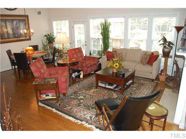 3733 Old Post Road Raleigh, NC 27612 - Photo 11 of 25 a living room with furniture and a large window