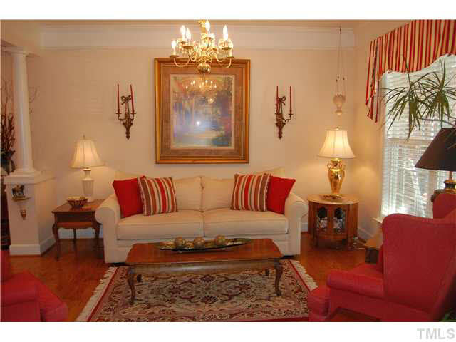 3733 Old Post Road Raleigh, NC 27612 - Photo 25 of 25 a living room with furniture and a lamp