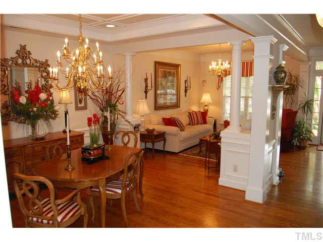 3733 Old Post Road Raleigh, NC 27612 - Photo 5 of 25 a living room with furniture and a chandelier