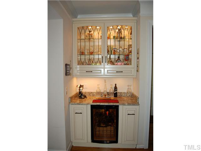 3733 Old Post Road Raleigh, NC 27612 - Photo 6 of 25 a kitchen with a sink and cabinets