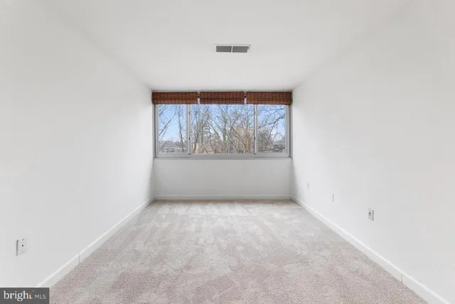 an empty room with a window