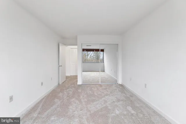 a view of an empty room and window