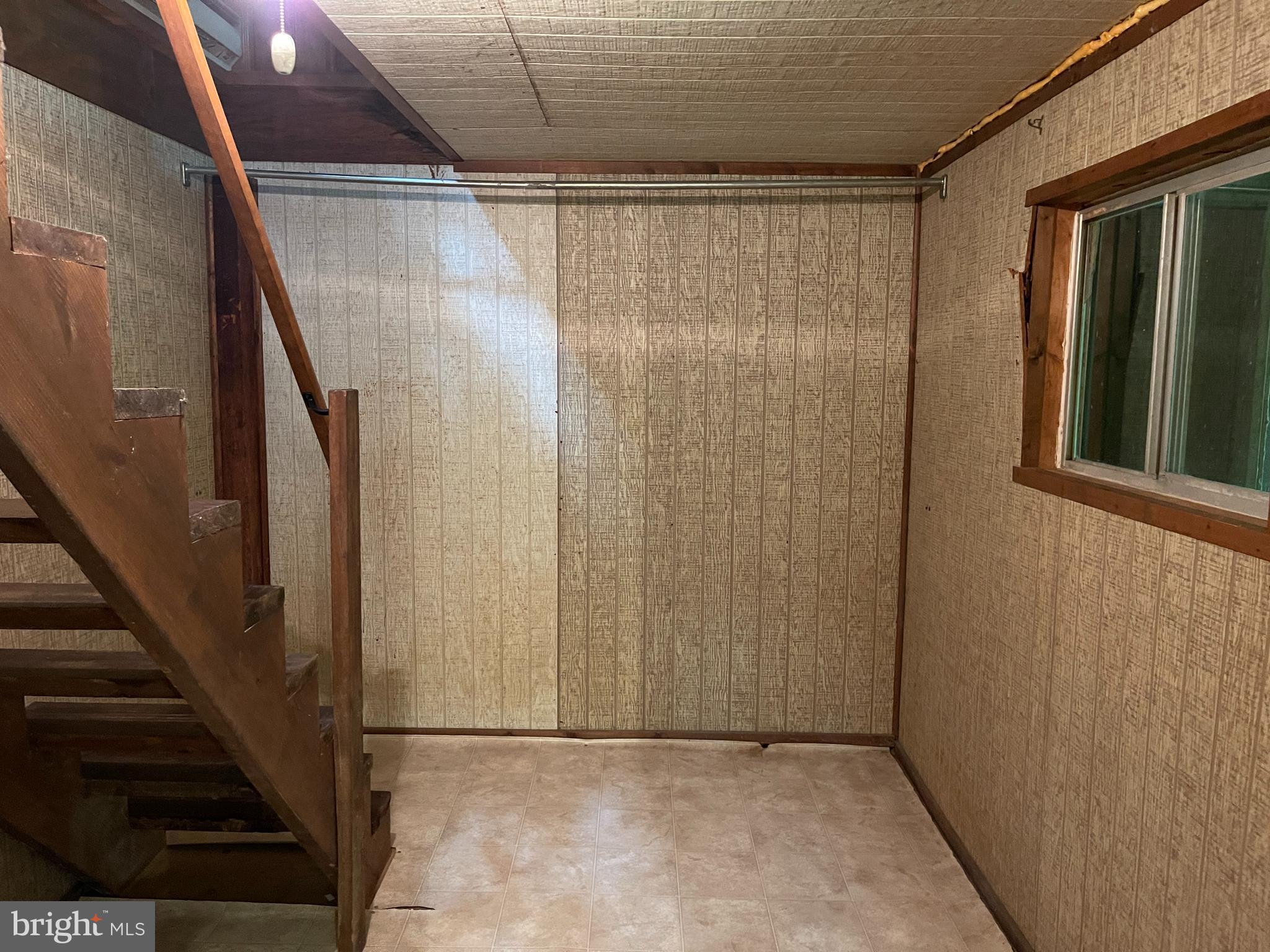 175 Howellsville Road Front Royal, VA 22630 - Photo 10 of 18 a view of an empty room with wooden floor
