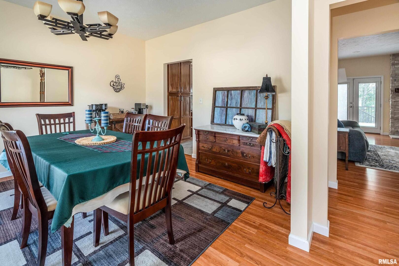145 Oakview Road Carbondale, IL 62901 - Photo 14 of 42 a view of a dining room with furniture and wooden floor