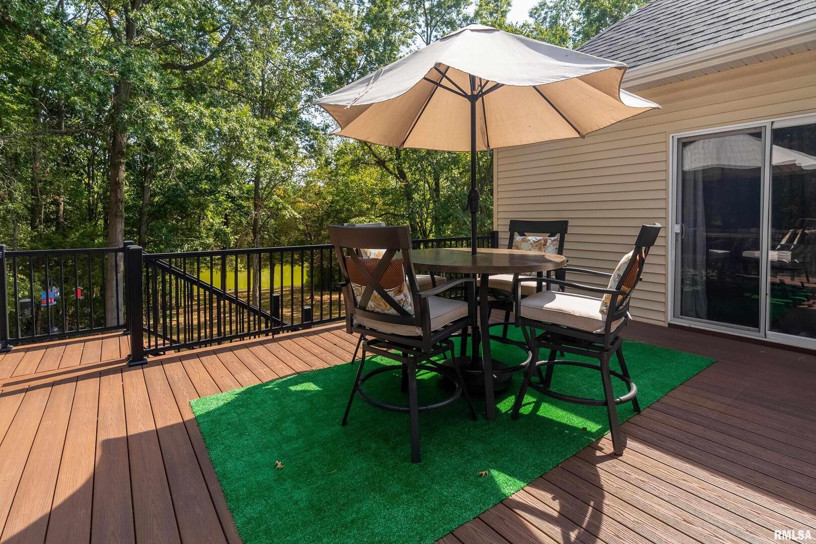 145 Oakview Road Carbondale, IL 62901 - Photo 31 of 42 a view of a table and chairs on the roof deck