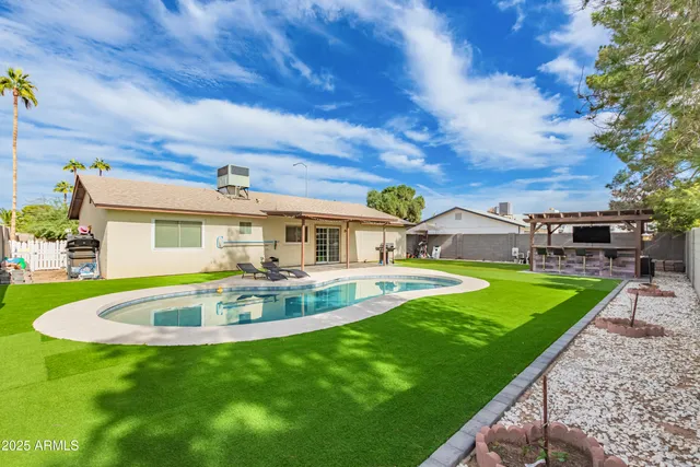 a front view of house with yard patio and green space