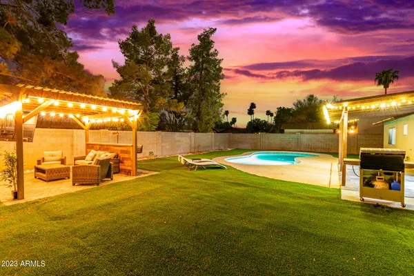 a view of an outdoor space and swimming pool