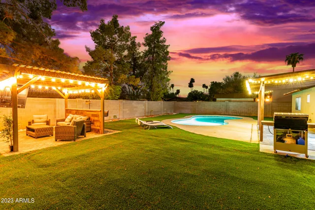 a view of an outdoor space and swimming pool