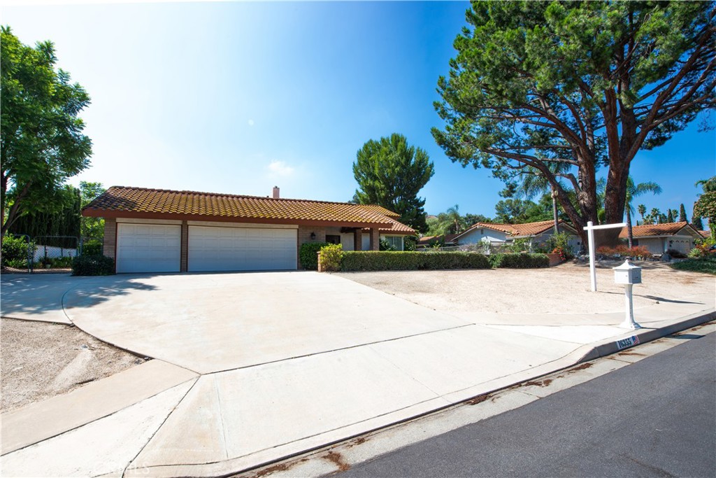 16355 Rancho Escondido Drive Riverside, CA 92506 - Photo 1 of 1 a front view of a house with a yard