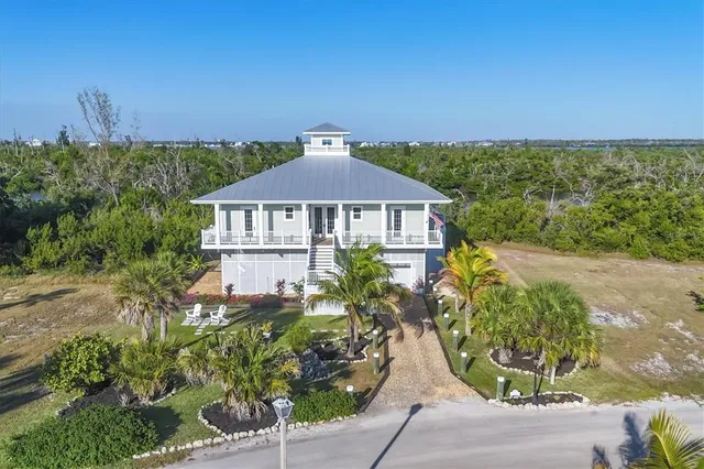 an aerial view of a house with a garden