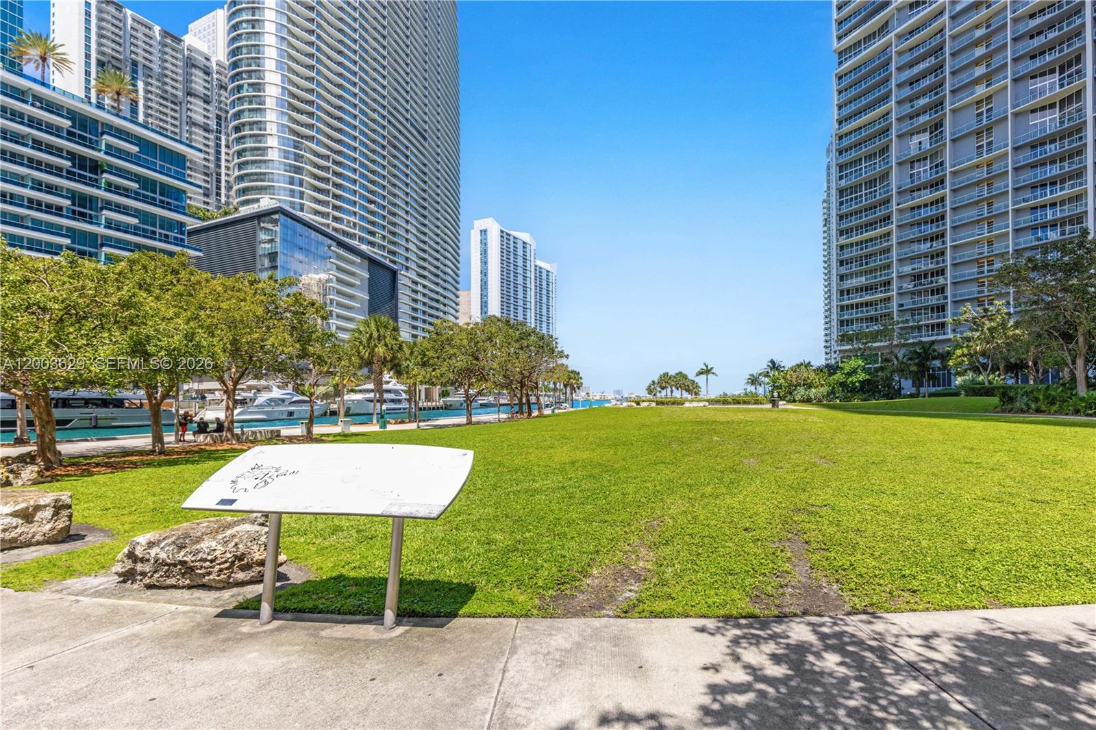485 Brickell Avenue, Unit 4501 Miami, FL 33131 - Photo 21 of 49 a view of a swimming pool with a lounge chairs