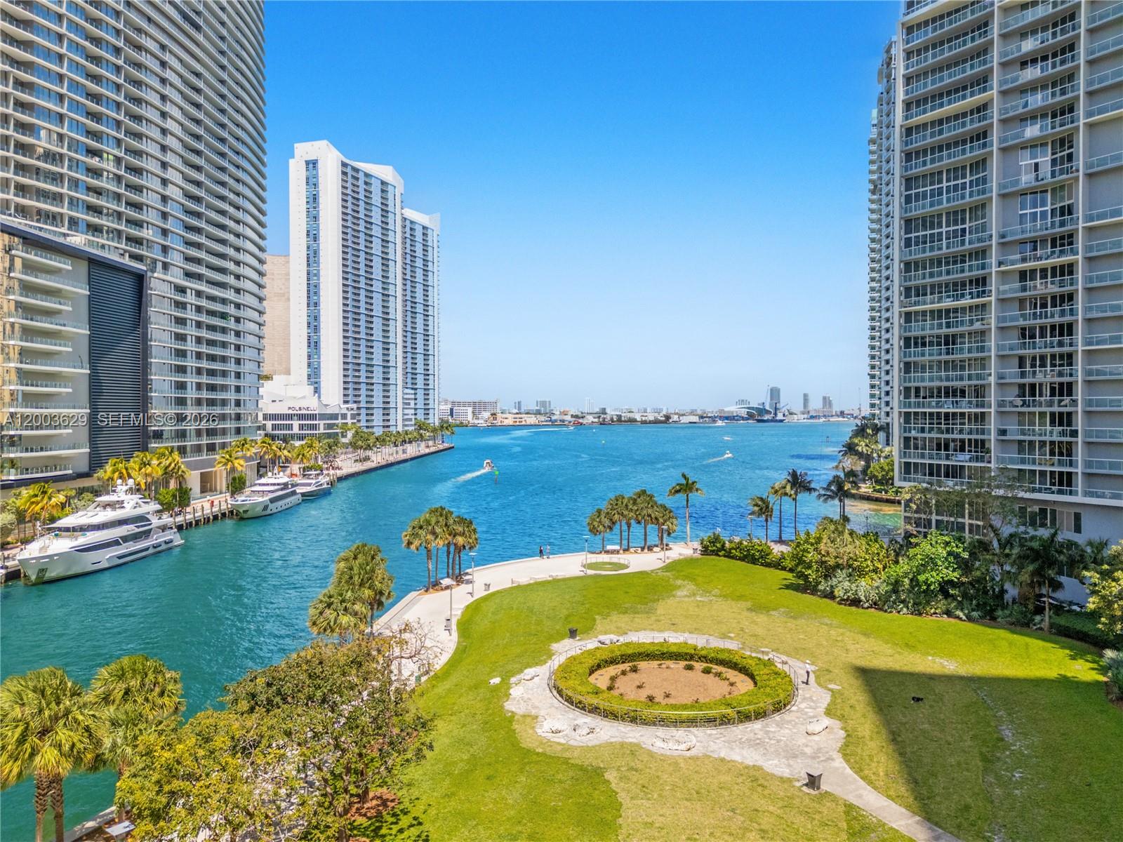 485 Brickell Avenue, Unit 4501 Miami, FL 33131 - Photo 23 of 49 a view of a swimming pool with a lounge chairs