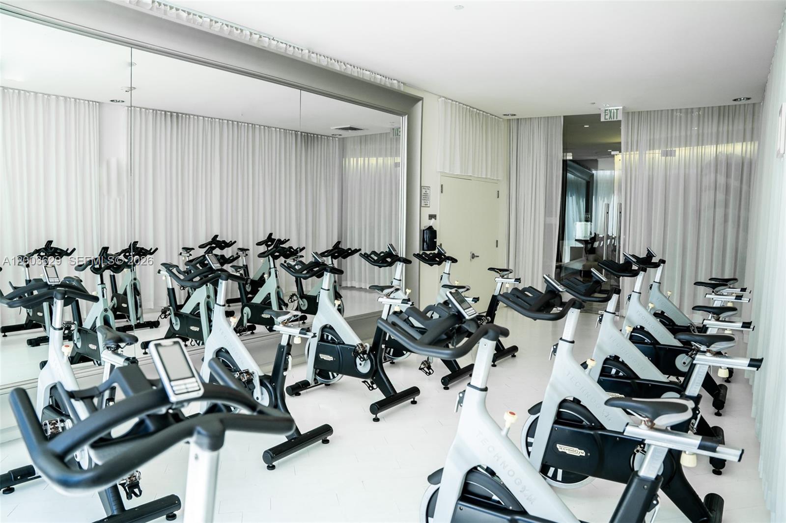 485 Brickell Avenue, Unit 4501 Miami, FL 33131 - Photo 44 of 49 a very nice looking room with many windows